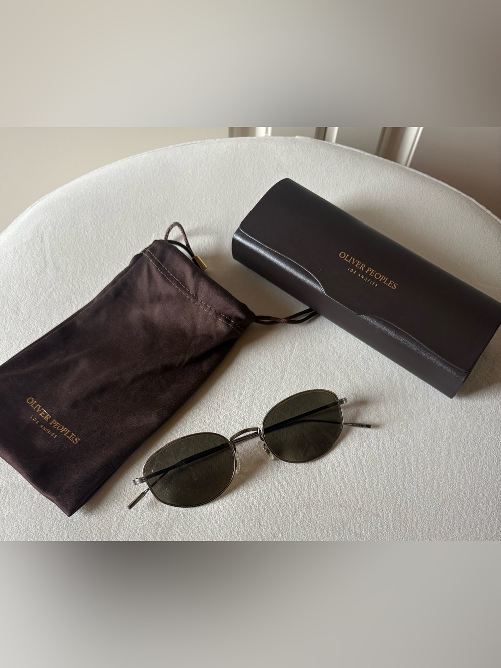 Oliver Peoples Titanium frame polarized sunglasses
